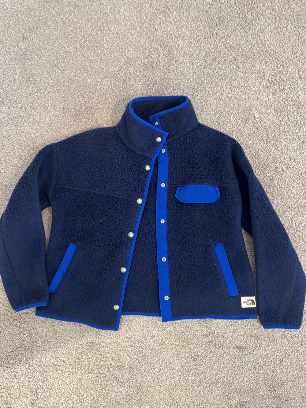 The North Face Kids Navy Blue Fleece Jacket with Bright Blue Trim